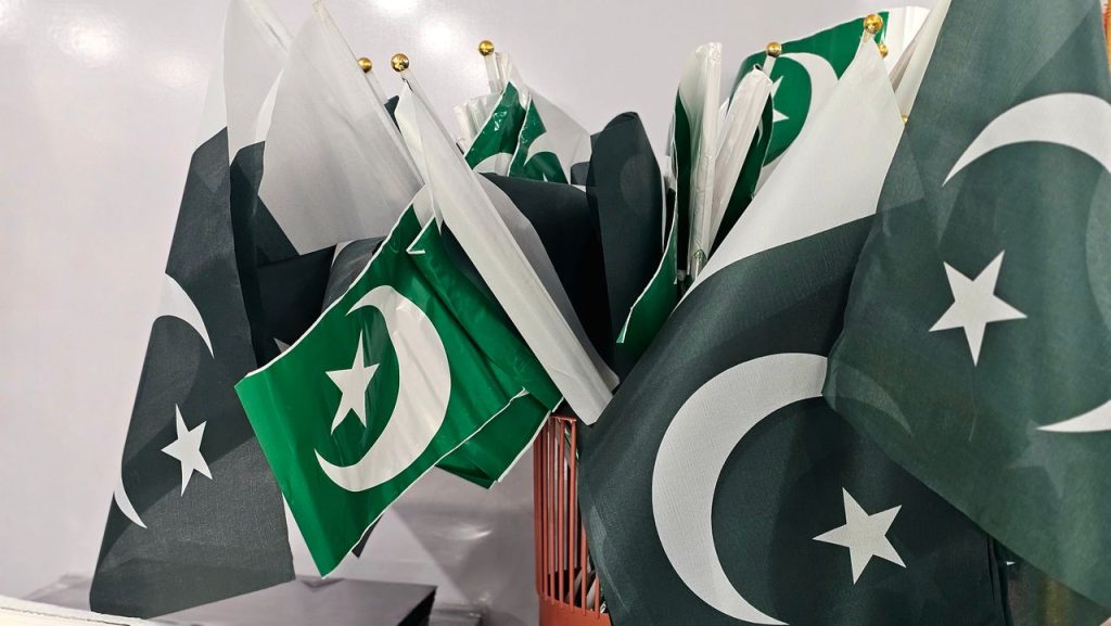 Crafting Captivating Headlines: Your awesome post title goes here A variety of Pakistani flags grouped together indoors, emphasizing national pride.